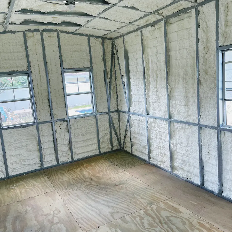 Closed-cell spray foam insulation applied to wall cavities in a residential project in Bartlesville
